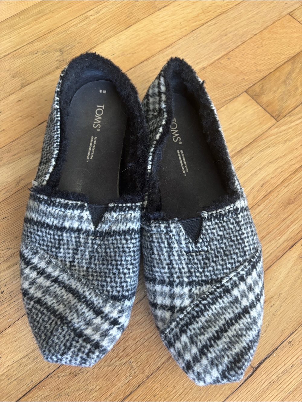 TOMS Women's Black & White Houndstooth Slip-On Moccasins